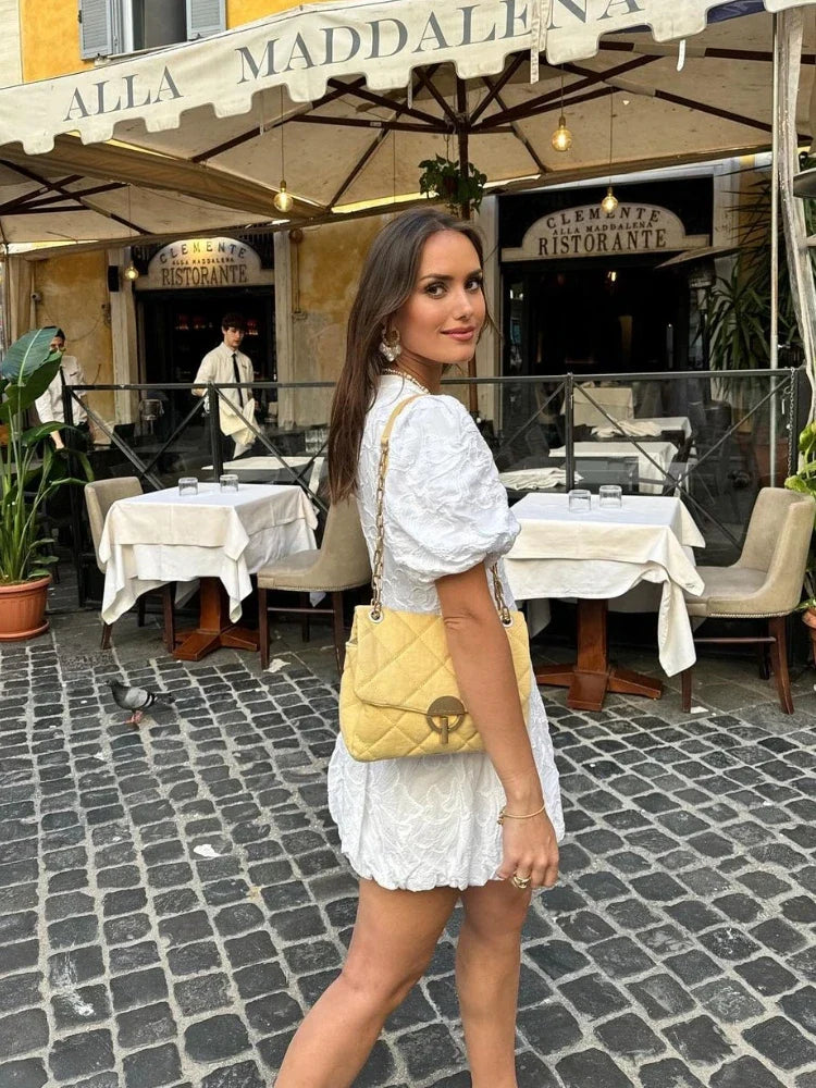 ALEJANDRA - MINIVESTIDO ABULLONADO
